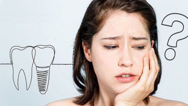 Nguyên nhân trồng răng implant bị sưng