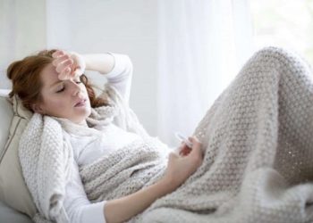 Nhổ răng khôn bị sốt có sao không?